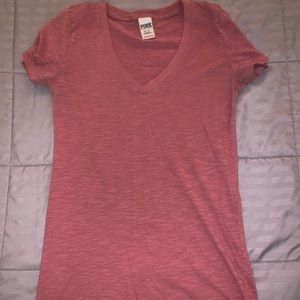 a pink t-shirt